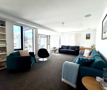 A light-filled penthouse retreat with west-facing sun and panoramic... - Photo 1