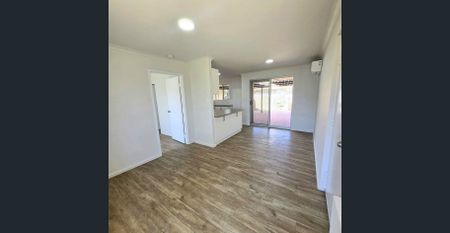 Refurbished Over 55's Unit with Courtyard - Photo 4