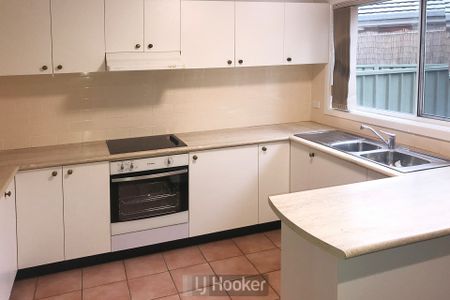 UPDATED THREE BEDROOM TOWNHOUSE BY THE LAKE! - Photo 5