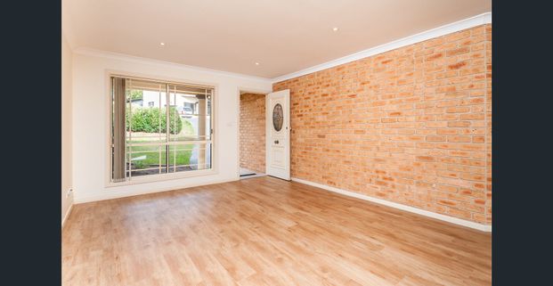 Highly Sought After Location with Fully Fenced Rear Courtyard - Photo 1