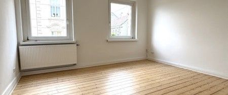 Frisch renovierte 3-Zi.-DG-Whg. mit Dielenboden und neuen Tageslichtbädern - Foto 1