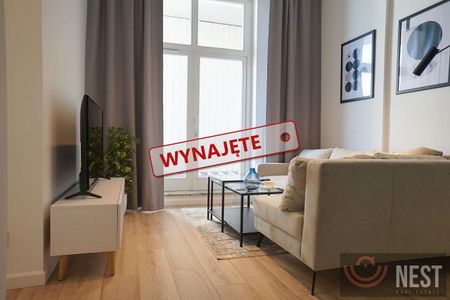 Apartament w prestiżowej kamienicy - Zdjęcie 5