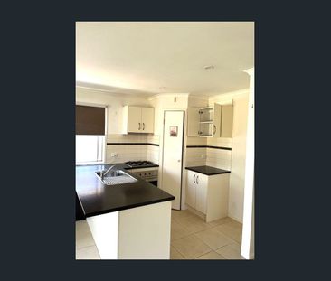 Beautifully Appointed 3-Bedroom Home in Prime Manor Lakes Location! - Photo 4