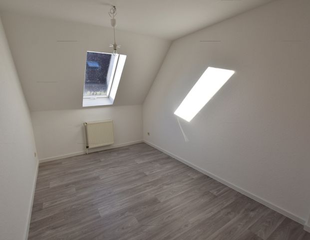 Zentral gelegene Obergeschosswohnung in Warsingsfehn - Foto 1