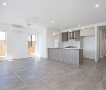 Modern 4-Bedroom Rental House in Logan Reserve - A Cozy Retreat Await - Photo 2