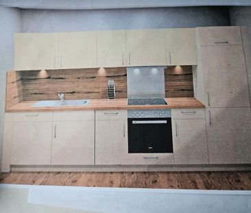 Neubau- Erdgeschosswohnung mit drei Zimmern in zentraler Lage von E... - Photo 4