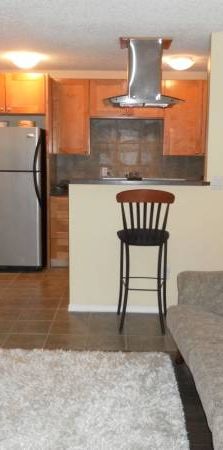 Beautiful Sunalta Condo - $400 OFF your First Month! - Photo 1