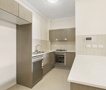 Sleek and Stylish One-Bedroom Apartment in a Prime Location - Photo 2