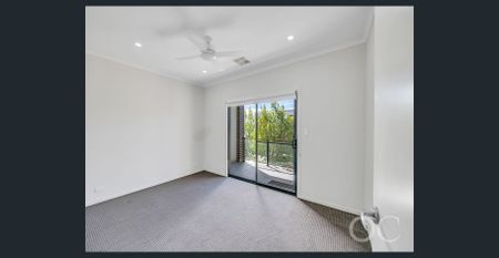 Open the Door to Low-Maintenance Living with a Private Courtyard & Balcony Retreat - Photo 4