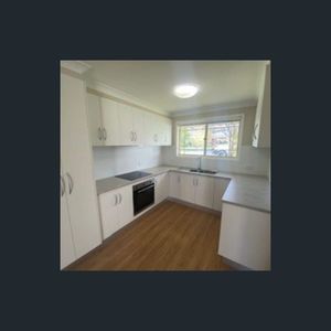 Neat 2-Bedroom Brick Unit in Sought-After North Hill - Photo 2