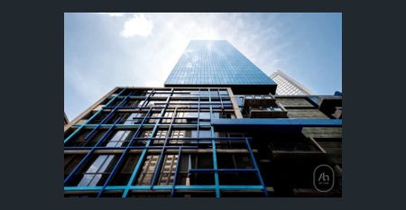 Stylish Furnished City Apartment with Study in an Unbeatable CBD Location - Photo 4