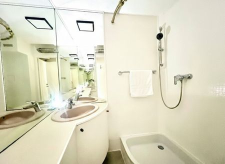 IM HERZEN NUSSDORFS I Urban trifft Weinberge – Modernes Single-Apartment mit Balkon und Heurigen um die Ecke - Foto 4