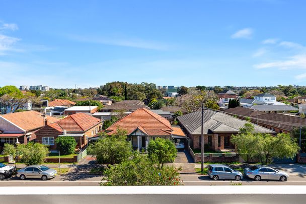 Renovated Apartment with Privacy & District Views - Photo 1