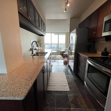 Elegant 2 Bed 2 Bath with 2 Balconies and Stunning Water Views - Photo 4