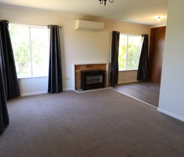 Elevated 3 Bedroom Home- Available 5.1.2026 - Photo 1