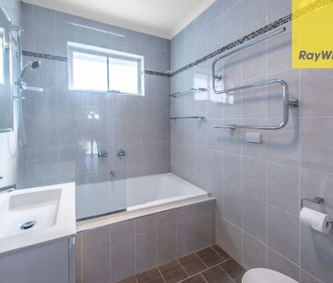 Classic Charm Meets Modern Convenience: Immaculately Renovated Thre... - Photo 6