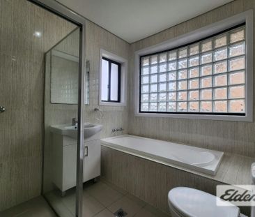 Modern 3-Bedroom Brick Townhouse with Double Lock-Up Garage - Photo 6