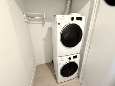 Stunning View! JR Two Bedroom Sub Penthouse in Metrotown with Parking and Storage - Photo 2