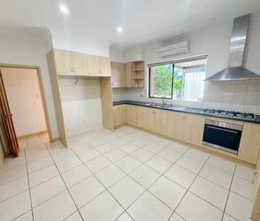 Charming Family Home with Versatile Living and Excellent Garaging - Photo 6