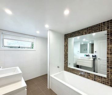 Beautifully Renovated Family Home with Spacious Entertaining Deck - Photo 6