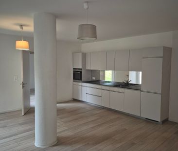 Appartement de 2.5 pièces au rez-de-chaussée - Photo 1