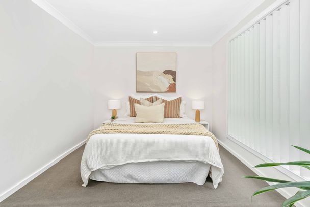 Contemporary Elegance: Bright, Stylish, and Convenient Living. - Photo 1