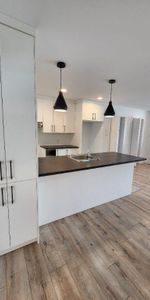 **4 ½**APPARTEMENT -style MAISON DE VILLE au CŒUR de STE-FOY - Photo 4