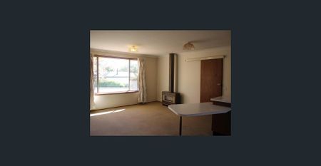 Tidy Two-Bedroom Unit in Peaceful Location - Photo 2