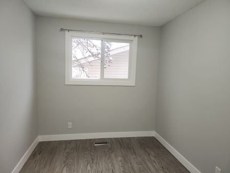 Newly Renovated Main Floor! Oversized Detached Garage Included! - Photo 2