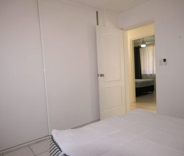 FURNISHED CHEVRON ISLAND 3 BEDROOM APARTMENT - Photo 6