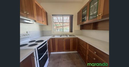 Spacious 3-Bedroom Home with Sunroom & Backyard! - Photo 5