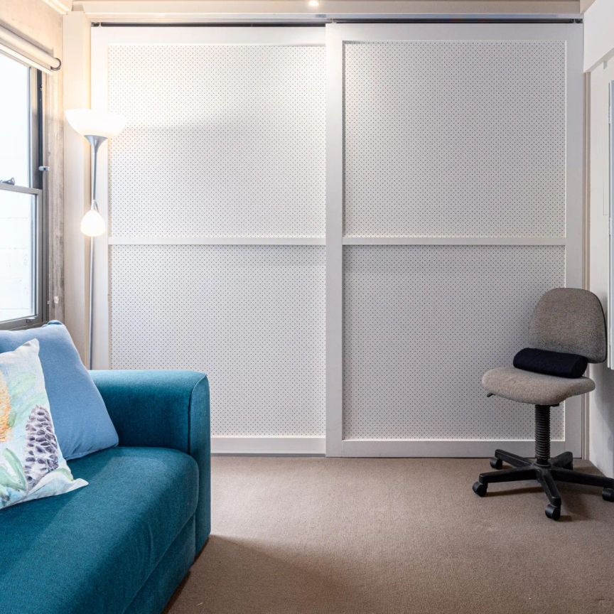 Stunning split-level apartment with views and parking and storage cage - Photo 1