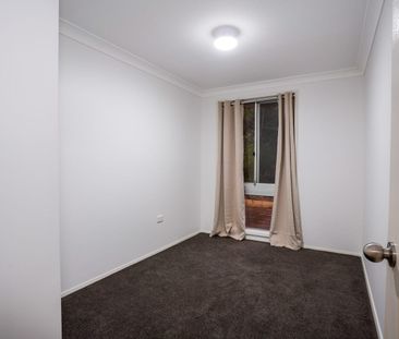 BRIGHT & COMFORTABLE HOME IN SOUGHT-AFTER LOCATION - Photo 2