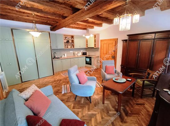 De inchiriat apartament unicat cu 2 camere langa Piata Mare din Sibiu - Photo 1
