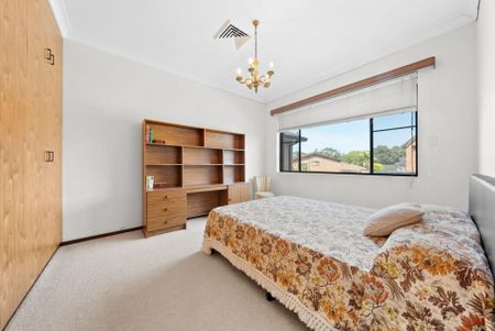 Spacious, Freshly Painted Family Home in a Prime Prairiewood Location - Photo 5