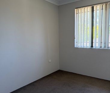 Freshly Painted, New Kitchen Two Bedroom Top Floor Unit - Photo 2