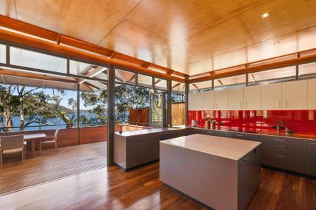 Waterfront Luxe � Architecturally Designed Home with Boatshed - Photo 4