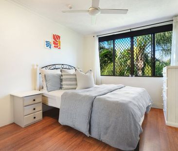 1 bedroom updated apartment surrounded by lush gardens & pool area - Photo 1