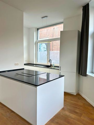 Volledig gerenoveerd gelijkvloers appartement met 2 slaapkamers te huur in Merksem - Photo 5