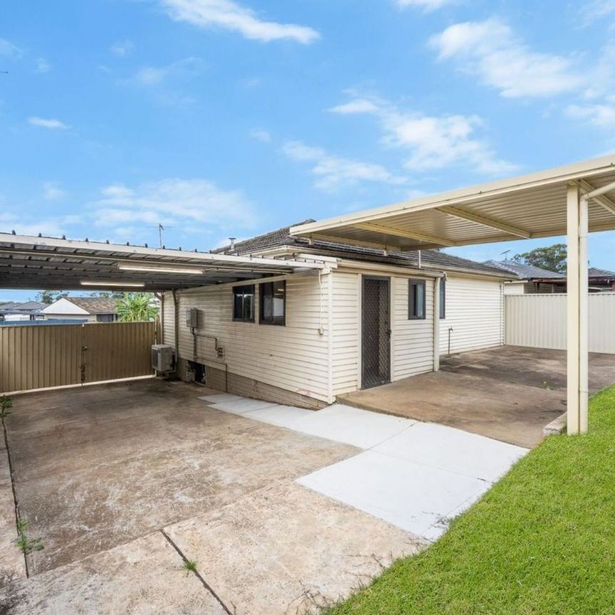 Well-Kept Family Home in a Convenient Location! - Photo 1