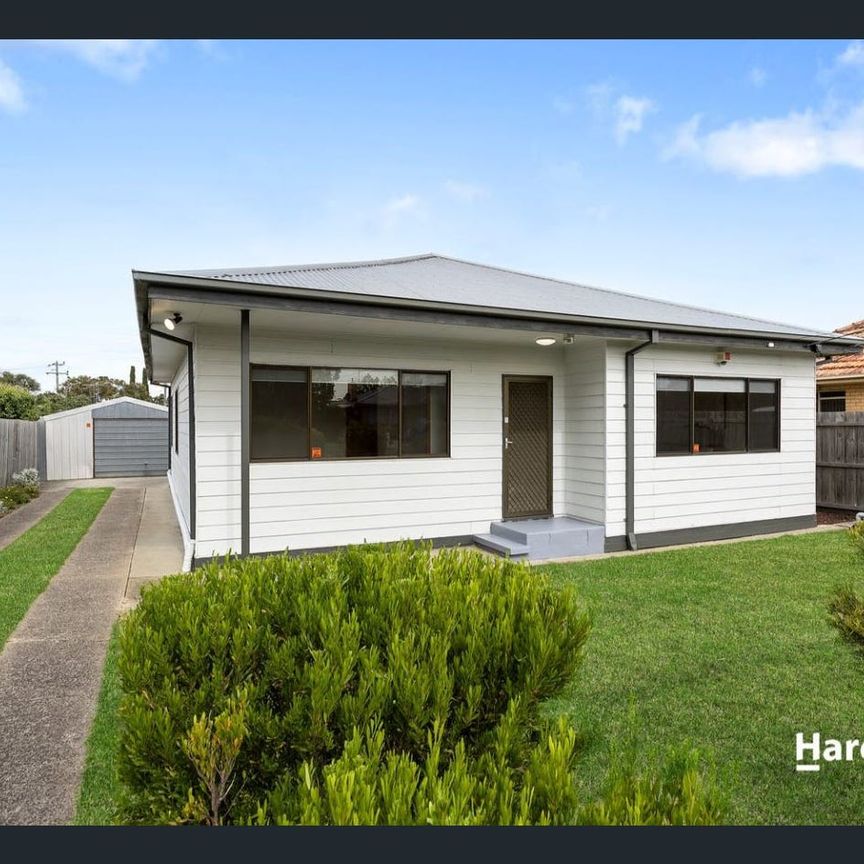 Quality Three-Bedroom Living with Multiple Living Areas and Secure Gardens! - Photo 1