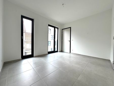 Modern 1-slaapkamerappartement met staanplaats te huur in Maasmechelen - Photo 2