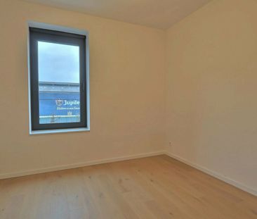 Nieuwbouw BEN 2-slaapkamerappartement met garage in Beveren - Photo 2