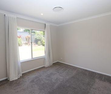 Gorgeous Family Home within Benowa State High School Catchment - Photo 4