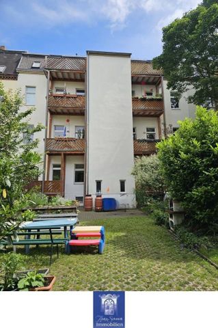 Perfekte Dachwohnung mit groÃem Balkon und tollen Blick in den grÃ¼nen Innenhof! - Foto 2