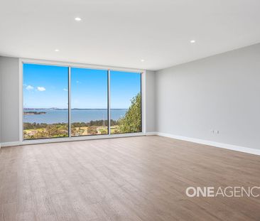 SPACIOUS FAMILY HOME IN KOONAWARRA - Photo 1