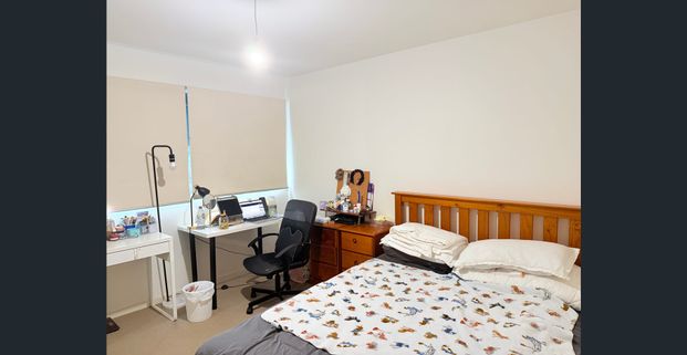 This 2-bedroom, 2-bathroom unit is available in both furnished and unfurnished options. - Photo 1