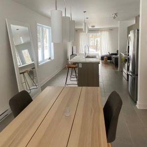 Grand 4 1/2 à l'étage - Photo 2