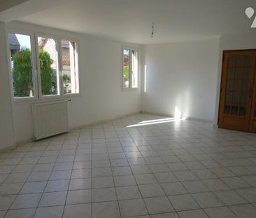 A louer, à BELBEUF (76240), une MAISON individuelle comprenant au R... - Photo 1