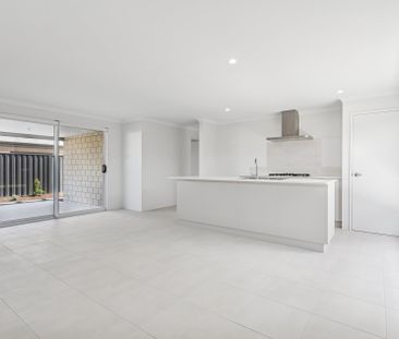 Practical, Spacious & Close to the Coast - Photo 1